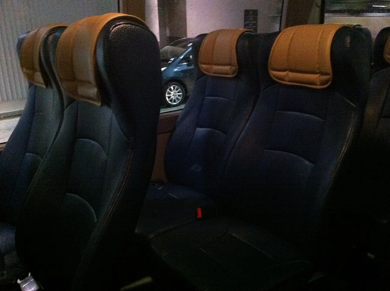 Passenger minibus seating. Representative interior, not the operator fleet.