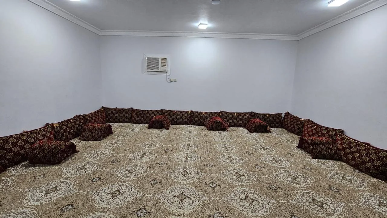 The private Istiraha indoor majlis with floor cushions.