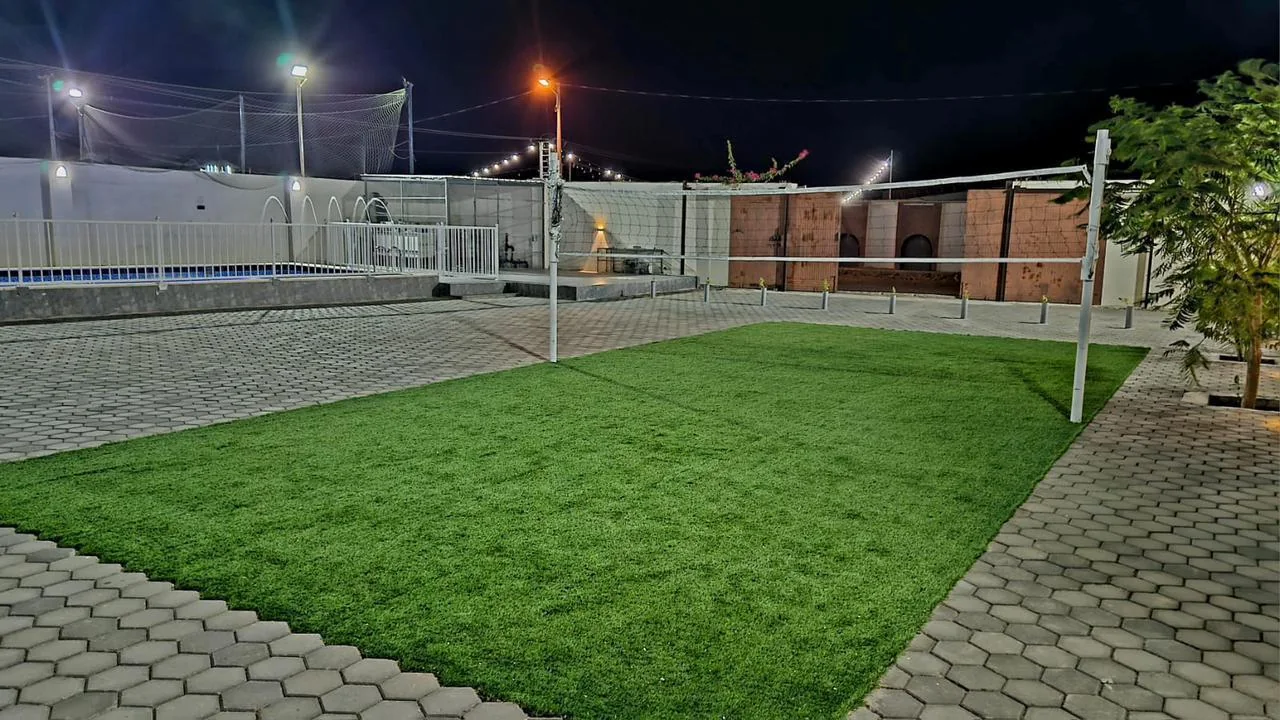 The volleyball area in the private Istiraha courtyard.