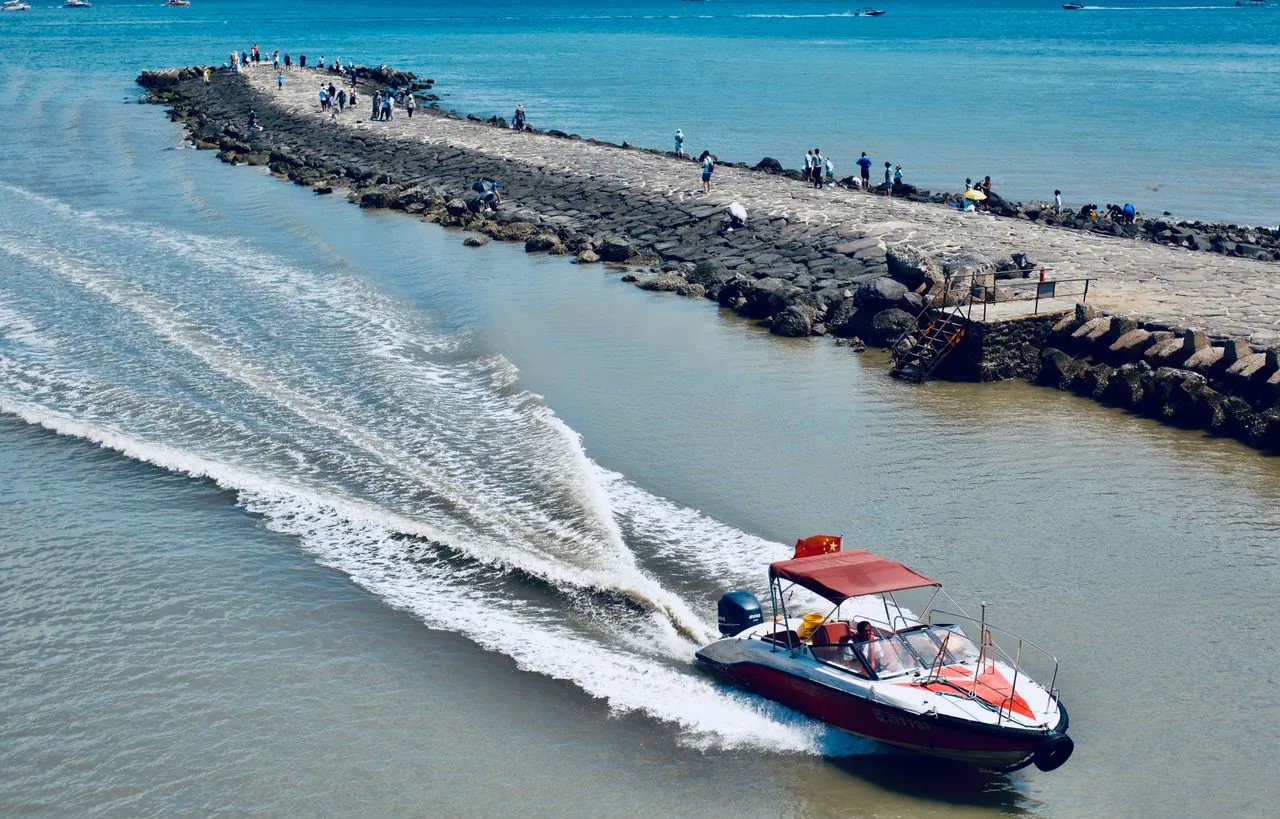 A motorboat moving across the sea.