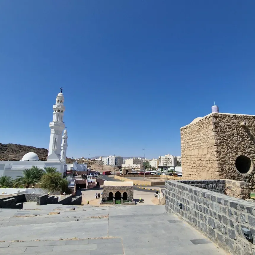Historic Madinah street and mosque on a walking route.